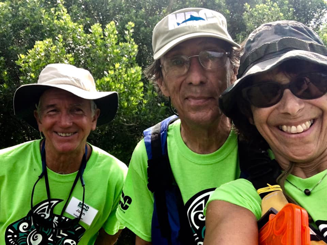 John (L) poses with kayak team members Susan and Roger at the 2019 Lagoonacy festival