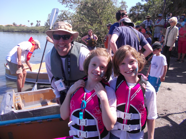Brooke (l) and Lindsey (r), pictured with their dad Michael, competed in the 2013 Lagoonacy Cardboard Boat Race