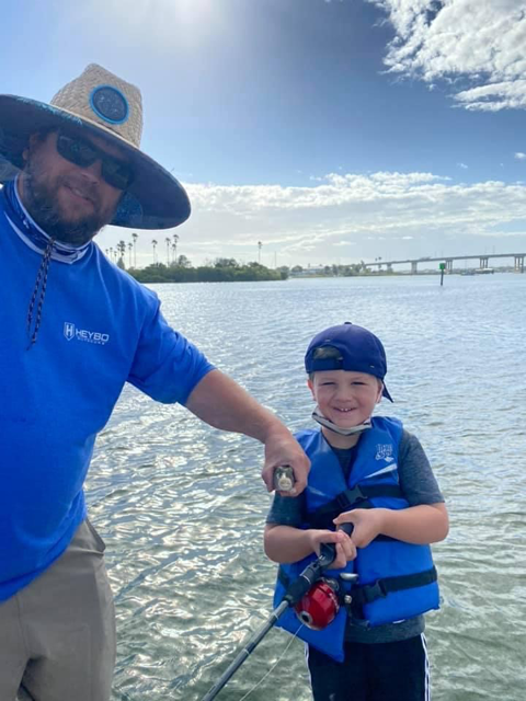 Chris Jenkins helps with fishing camp